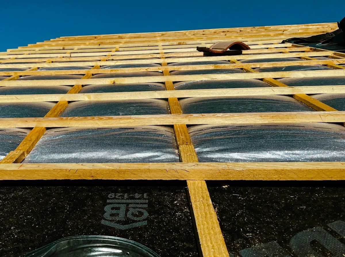 Roof Replacement in Milford — new roof battens laid over insulation boards during a re-roof
